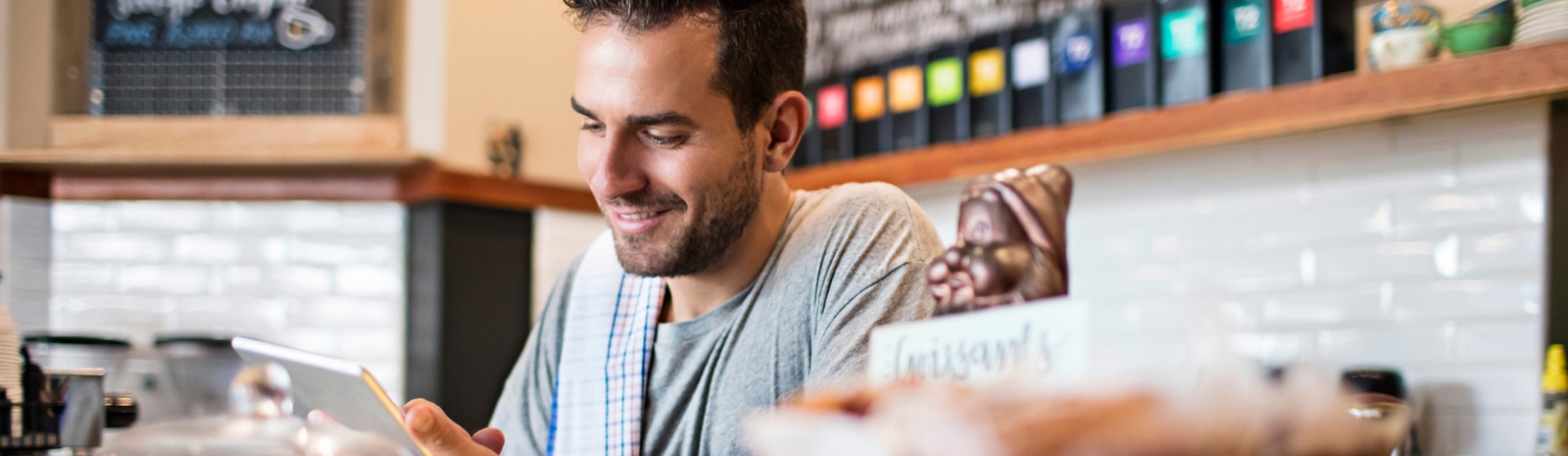 Worker smiling at restaurant