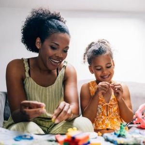 Mother and daughter working on crafts