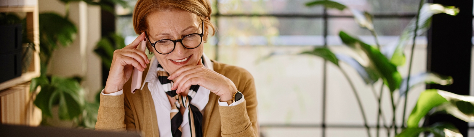 Woman smiling and talking on cell phone